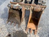 a close up of a construction vehicle ' s front end and front end