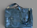 blue leather briefcase bag with strap and shoulder strap
