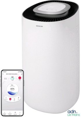 the air purifier is next to a smart phone