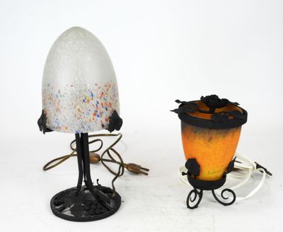 two lamps that are next to each other on a table