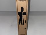 a cardboard box that has a picture of a woman and a dog on it