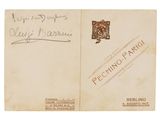an old postcard with a picture of a man and a woman on it