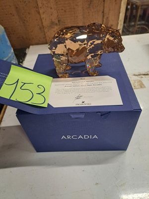 a blue box with a gold figurine on top of it