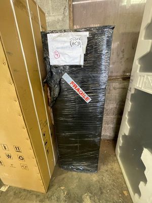 a stack of boxes sitting next to each other in a room