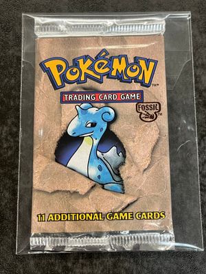 a close up of a pokemon trading card game in a plastic case