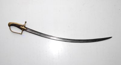 a close up of a sword on a white surface