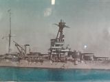 a picture of a picture of a battleship in the water