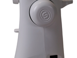 an image of a white sewing machine on a white background
