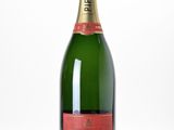 l'image d'une bouteille de champagne sur une surface blanche