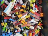 a bin full of various types of cosmetics and makeup products