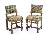 pair of antique chairs with floral upholstered upholstered seats