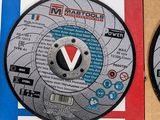 three different types of grinding discs in a box on a white surface