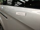 a close up of a car with a sticker on it