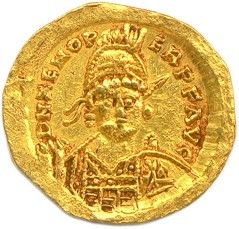 une pièce d'or portant l'image d'un homme