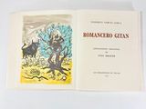 an open book with a picture of a man and a cow