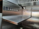 a stainless steel counter top in a commercial kitchen