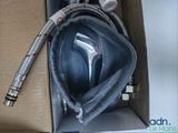 a box with a hose and a razor in it