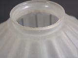 a close up of a white vase with a black background