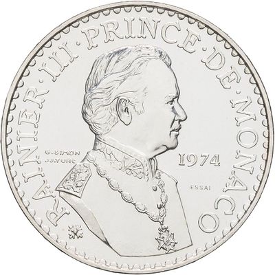 a close up of a coin with a woman ' s face on it