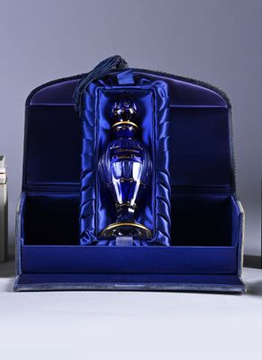 a blue case that has a wine glass inside of it