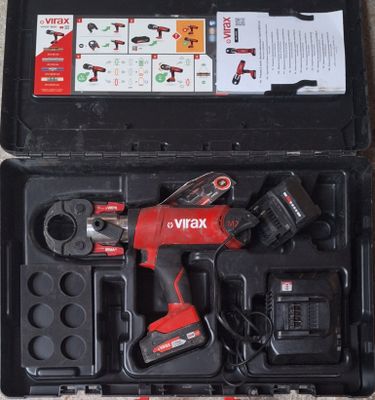 a box with tools in it sitting on the floor