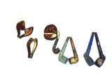 five different types of pipe holders on a white surface