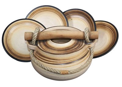 a brown and white vase with a rope around it