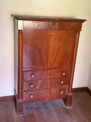 Secrétaire en placage d'acajou, ornementation à demies colon…