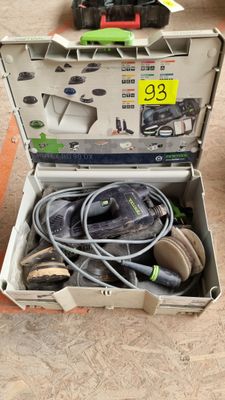 a box with a bunch of tools in it on the floor