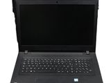 an open laptop computer sitting on top of a black bag