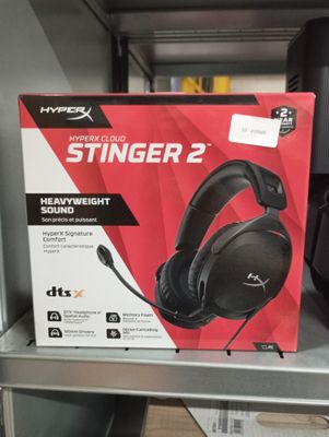 the box of a gaming headset sitting on a shelf in a store