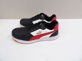 a pair of black and red sneakers on a white surface