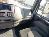 a view of the inside of a vehicle from the driver ' s seat