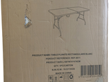cardboard box with a drawing of a table in it on a white background
