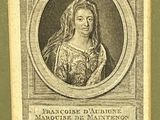an old picture of a woman with long hair in a frame