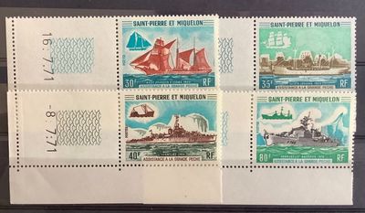 four stamps with a ship on them on a black surface