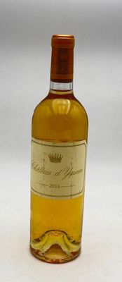 a bottle of wine that is sitting on a table