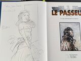 a book with a drawing of a woman and a picture of a man
