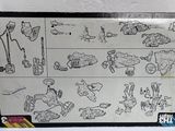 a white board with drawings on it sitting on a table