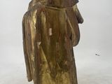 brass figurine of a woman holding a child in her arms