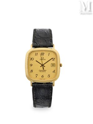 une photo d'une montre-bracelet plaquée or