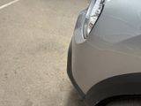 a close up of a car parked in a parking lot