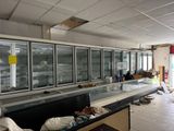 an image of a commercial kitchen with a lot of counter space