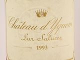 a close up of a bottle of wine with a crown on it