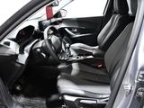 a picture of the inside of a car with the driver ' s seat up