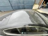 a car that is parked in front of a building