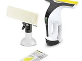 a close up of a yellow and black vacuum cleaner and a cleaning cloth