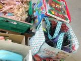 a pile of assorted toys on a table in a store