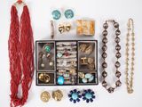 a collection of assorted jewelry including rings, bracelets, and necklaces