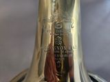 a close up of a brass bell on a table